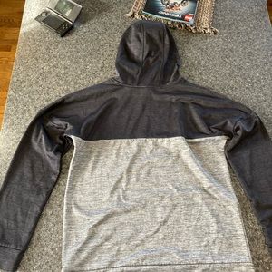 Black/grey contrast young men’s Adidas hoodie.